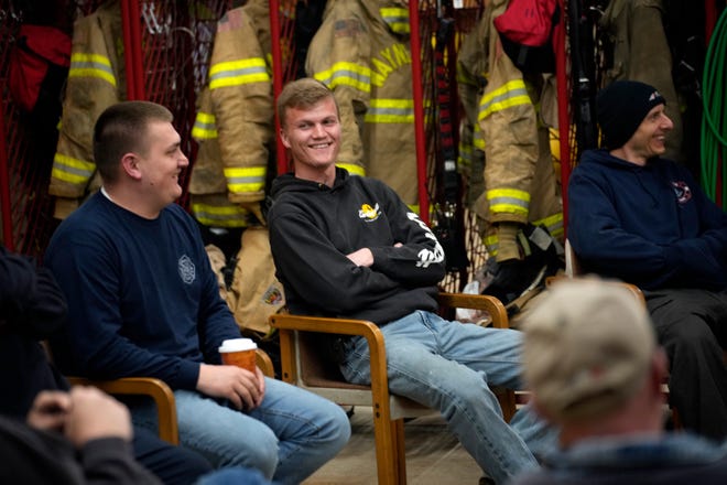 Mar 5, 2024; Greenfield, OH, United States; Gabe Arazo laughs as he attends for the first time during a meeting with Volunteer Firefighters at the Wayne Township Fire Department in Good Hope, Ohio.