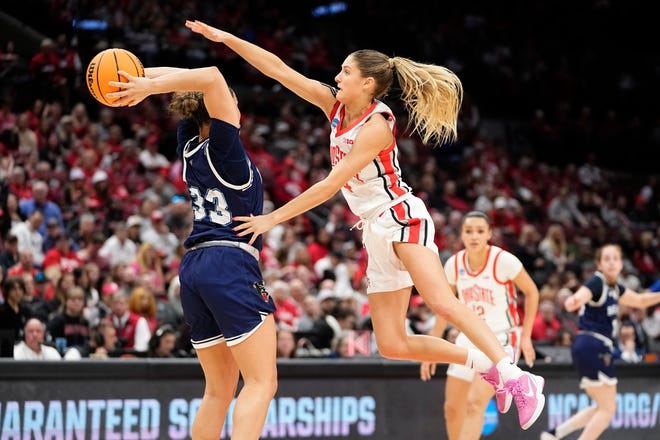 Mar 22, 2024; Columbus, OH, USA; Ohio State Buckeyes guard Jacy Sheldon (4) guard Maine Black Bears forward Adrianna Smith (33) during the second half of the women’s basketball NCAA Tournament first round game at Value City Arena. Ohio State won 80-57.