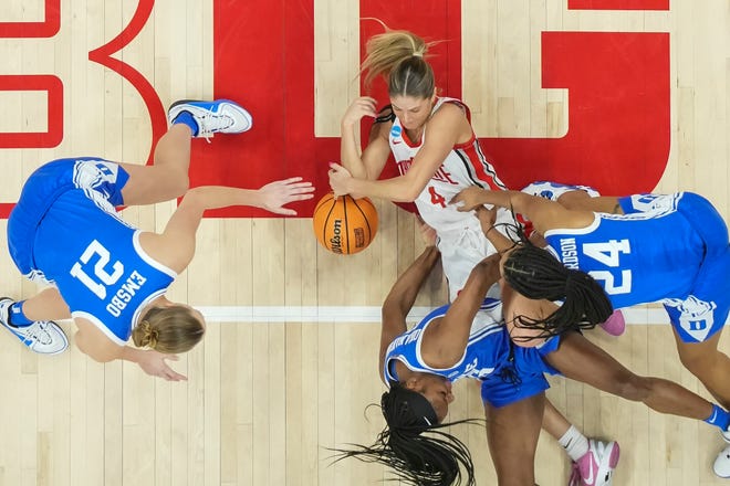 Mar 24, 2024; Columbus, OH, USA; Ohio State Buckeyes guard Jacy Sheldon (4) scramble for a loose ball with Duke Blue Devils guard Reigan Richardson (24), guard Oluchi Okananwa (5) and forward Camilla Emsbo (21) during the second half of the women’s NCAA Tournament second round at Value City Arena. Ohio State lost 75-63.