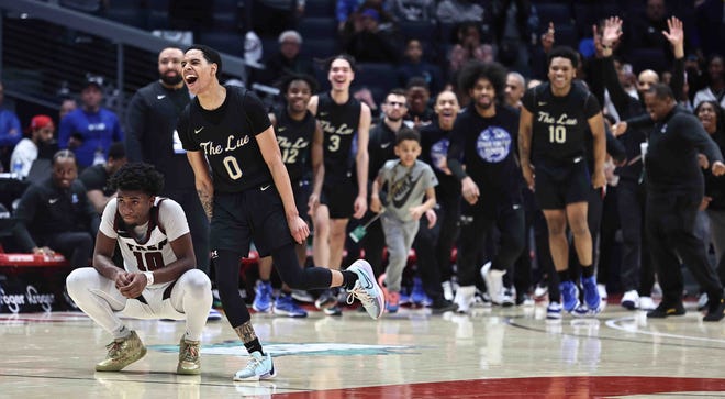 Harvest Prep guard Brandon Roddy (10) reacts as Lutheran East guard Anthony Bruce (0) celebrates during the Warriors' loss in the Division III state championship game Sunday, March 24, 2024.