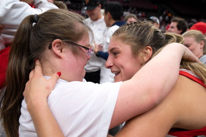 Ohio State senior guard Jacy Sheldon celebrates with her sister, Emmy, after the Buckeyes beat Tennessee earlier this season. Sheldon has been sidelined with a right foot injury.