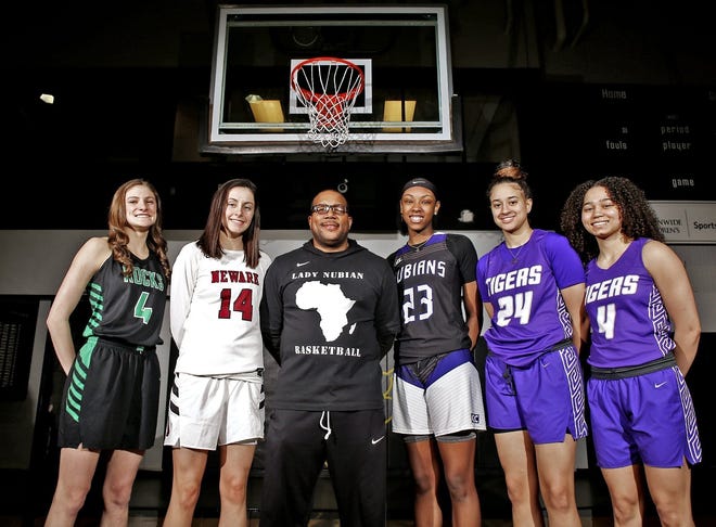 The Dispatch All-Metro girls basketball team, photographed on Monday, March 11, 2019 at Ohio Dominican University. Left to right: Jacy Sheldon, Dublin Coffman; Katie Shumate, Newark; coach Will McKinney, Africentric; Jordan Horston, Africentric; Maliya Perry, Pickerington Central; Madison Greene, Pickerington Central. [Fred Squillante/Dispatch]