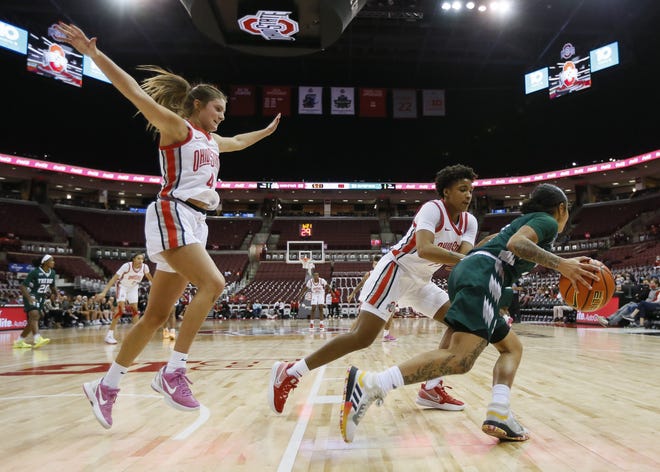 Ohio State Buckeyes guard Jacy Sheldon (4) and guard Hevynne Bristow (21) guard Slippery Rock guard Daeja Quick (3) during the third quarter of the NCAA women's exhibition basketball game at Value City Arena in Columbus on Wednesday, Nov. 3, 2021.