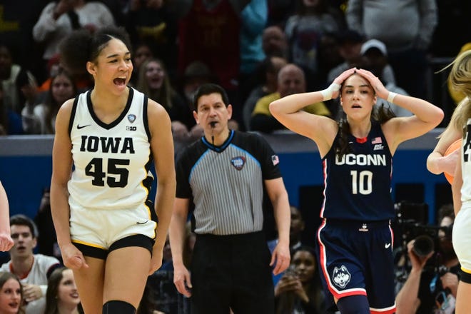 Apr 5, 2024; Cleveland, OH, USA; Iowa Hawkeyes forward Hannah Stuelke (45) reacts against the Connecticut Huskies in the semifinals of the Final Four of the womens 2024 NCAA Tournament at Rocket Mortgage FieldHouse. Mandatory Credit: Ken Blaze-USA TODAY Sports